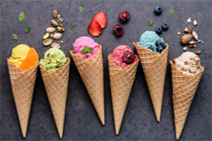 Six cones of different flavors of gelato.