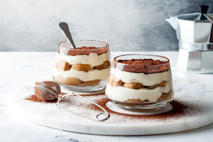 Classic layers of cookies and  mousse topped with chocolate/coffee mixture